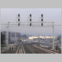 Caltrain_CP-TROUSDALE-sb-gantry-rear-zoom-cloudy-soft.jpg