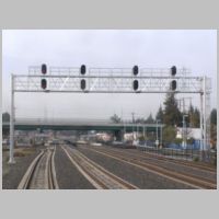 Caltrain_Signal-411-nb-gantry-3xAvd-App-cloudy.jpg