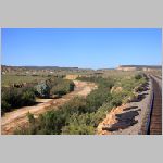 BNSF_Gallup-Sub-173.1-dry-riverbed+rock-cliffs-far-wb.jpg