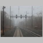 Amt_OAK-nb-gantry-rear-rainy.jpg
