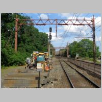 NJT_MILBURN-eb-masts-wide-sunny.jpg